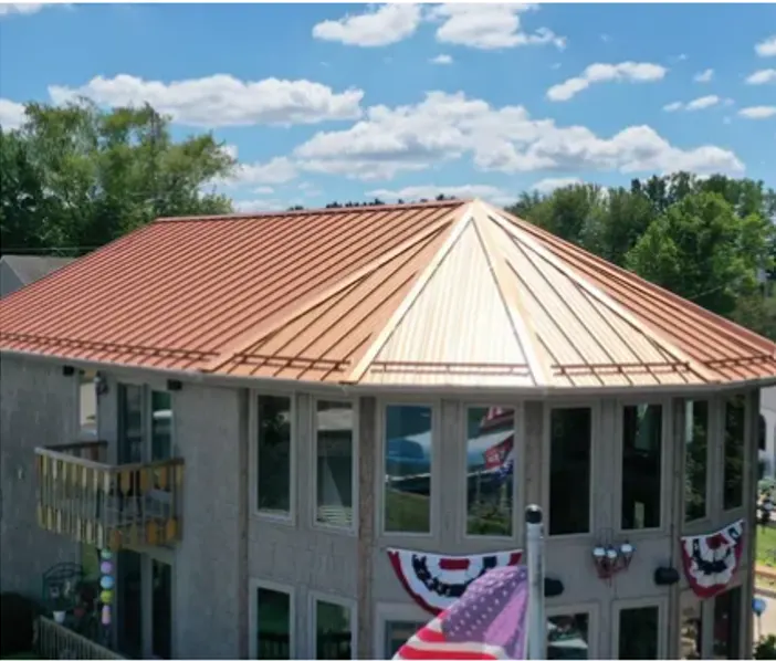 Storm damage documentation on a Holliday Park commercial building
